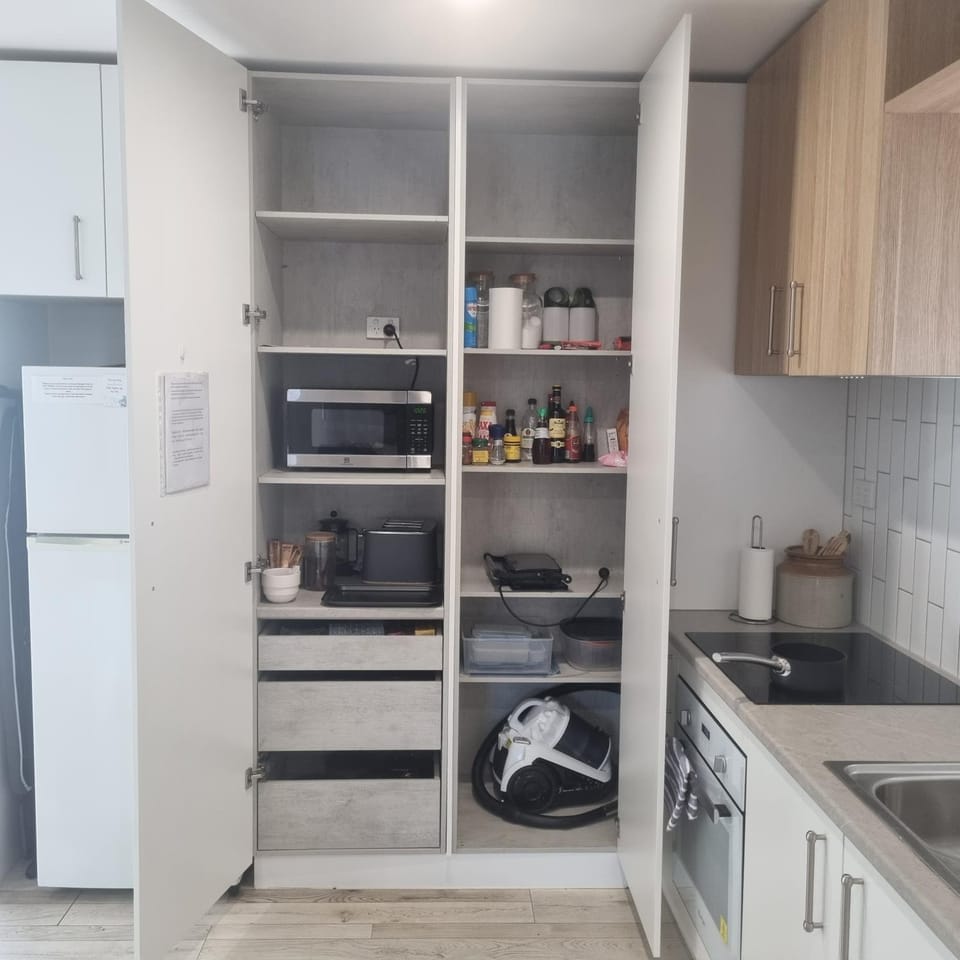 Kitchen or kitchenette, oven, stove, toaster