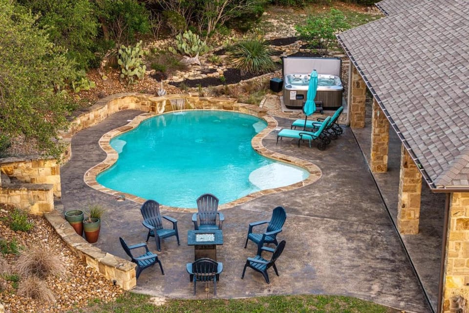 Property building, Patio, Pool view, Swimming pool, sunbed