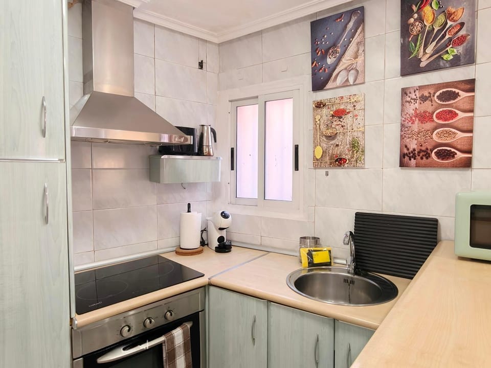 Kitchen or kitchenette, stove, toaster