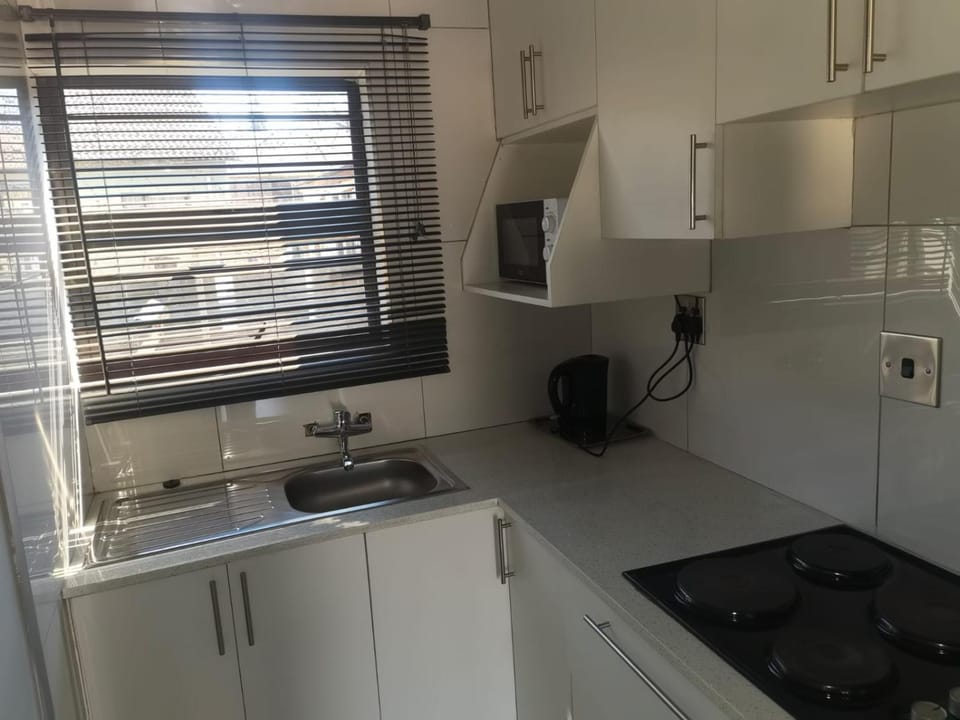 Kitchen or kitchenette, microwave