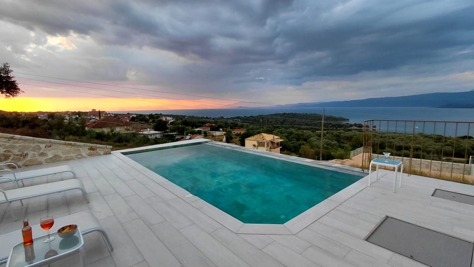 Nearby landmark, Natural landscape, View (from property/room), Balcony/Terrace, Pool view, Sea view, Sunset, sunbed