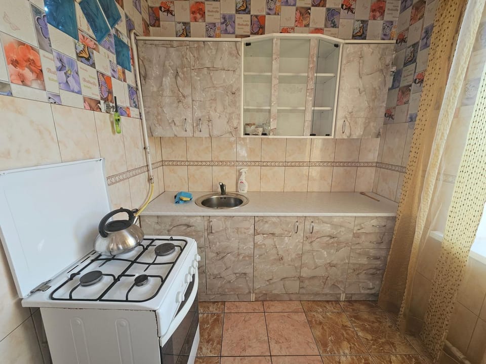 Kitchen or kitchenette, stove