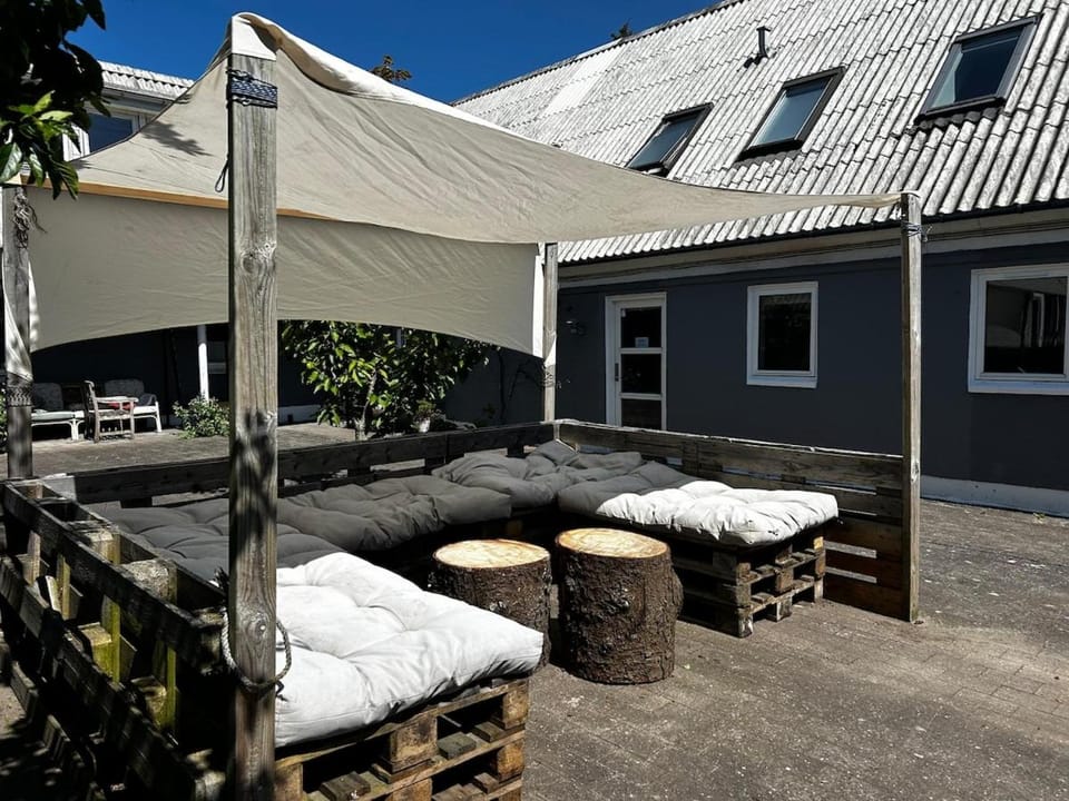 Property building, Patio, Day, Living room, Seating area, Inner courtyard view