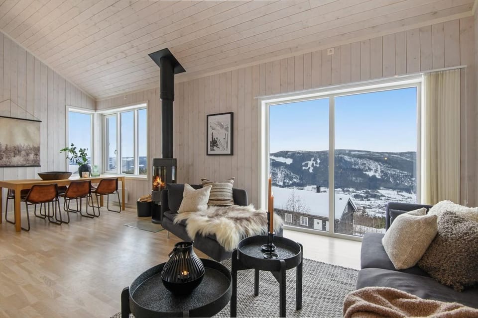Natural landscape, Living room, Seating area, Dining area, Mountain view, fireplace
