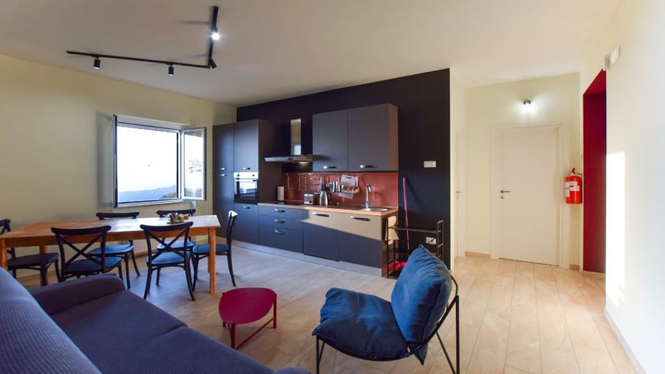 Kitchen or kitchenette, Living room, Seating area, Dining area, Sea view