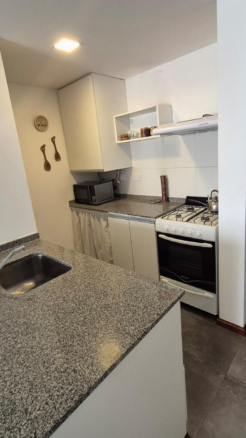 Kitchen or kitchenette, stove