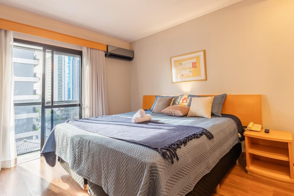 Bed, Photo of the whole room, Bedroom, towels, air conditioner
