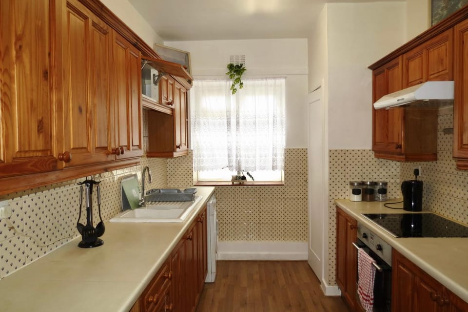 Kitchen or kitchenette, stove