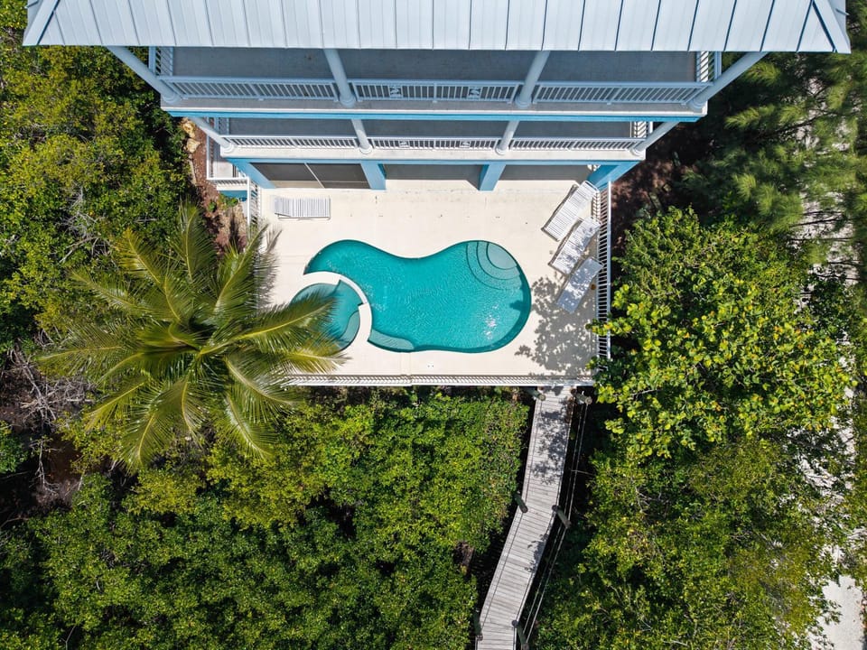 Mermaid Cove - Beach-to-River Retreat with Pool, Hot Tub, Private Dock, Boat Lift House in Hutchinson Island