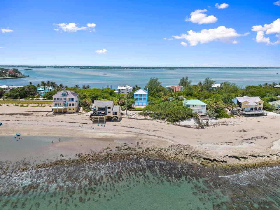 Mermaid Cove - Beach-to-River Retreat with Pool, Hot Tub, Private Dock, Boat Lift House in Hutchinson Island