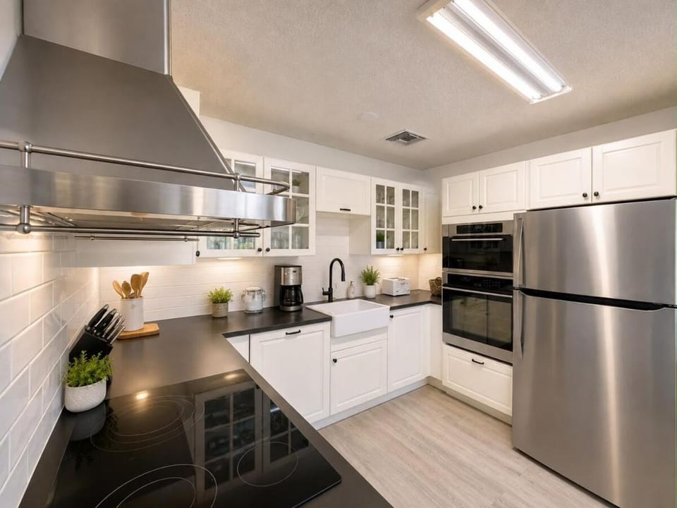 Kitchen or kitchenette, dishwasher, oven, stove, toaster
