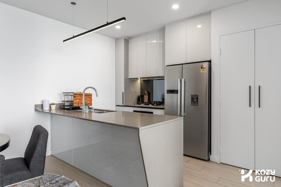 KozyGuru | Lidcombe | Olympic Park Skyline Retreat Apartment in Lidcombe