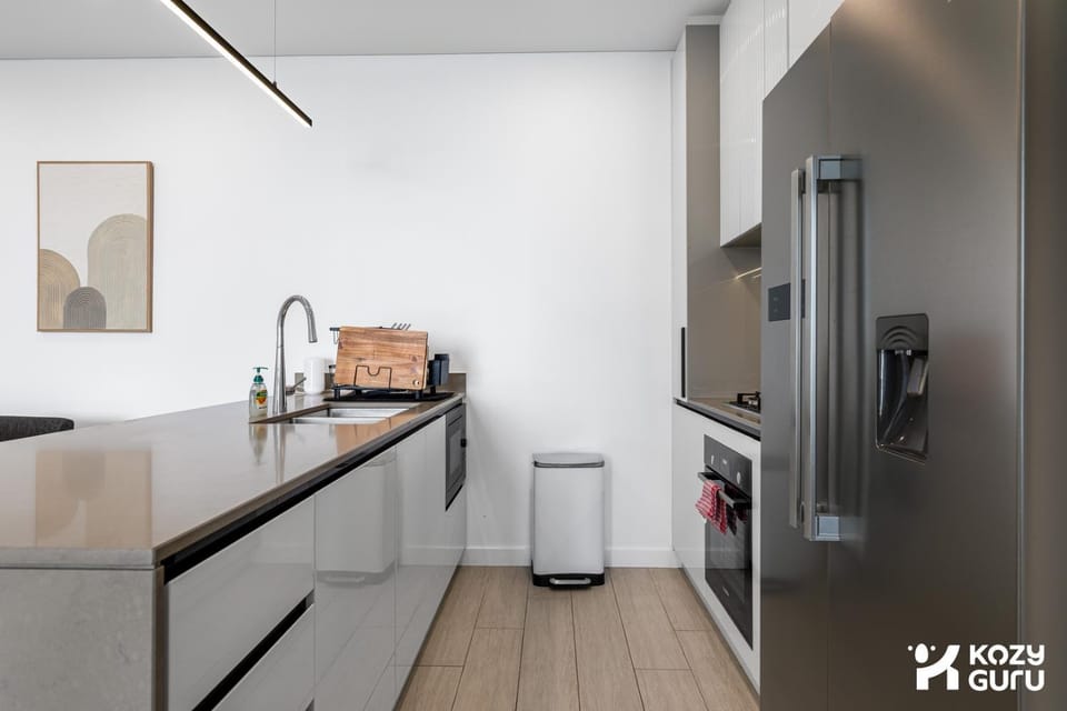 KozyGuru | Lidcombe | Olympic Park Skyline Retreat Apartment in Lidcombe