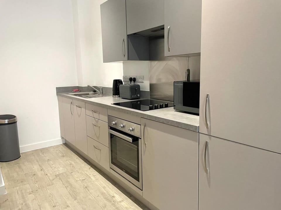 Coffee/tea facilities, Kitchen or kitchenette, dishwasher, oven, stove, toaster