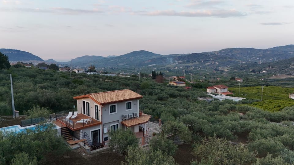 Property building, Nearby landmark, Natural landscape, Bird's eye view, Mountain view