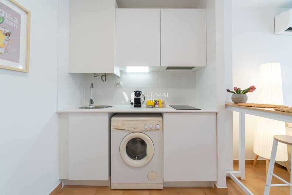 Kitchen or kitchenette, washing machine