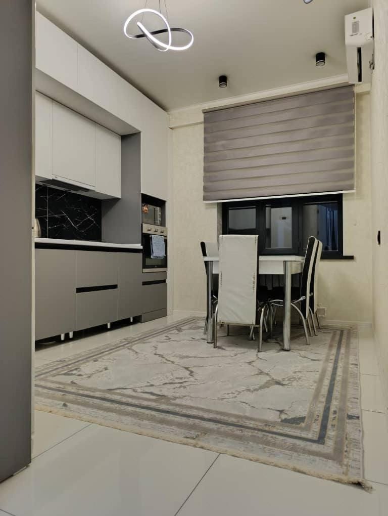Kitchen or kitchenette, Dining area, microwave, oven, air conditioner