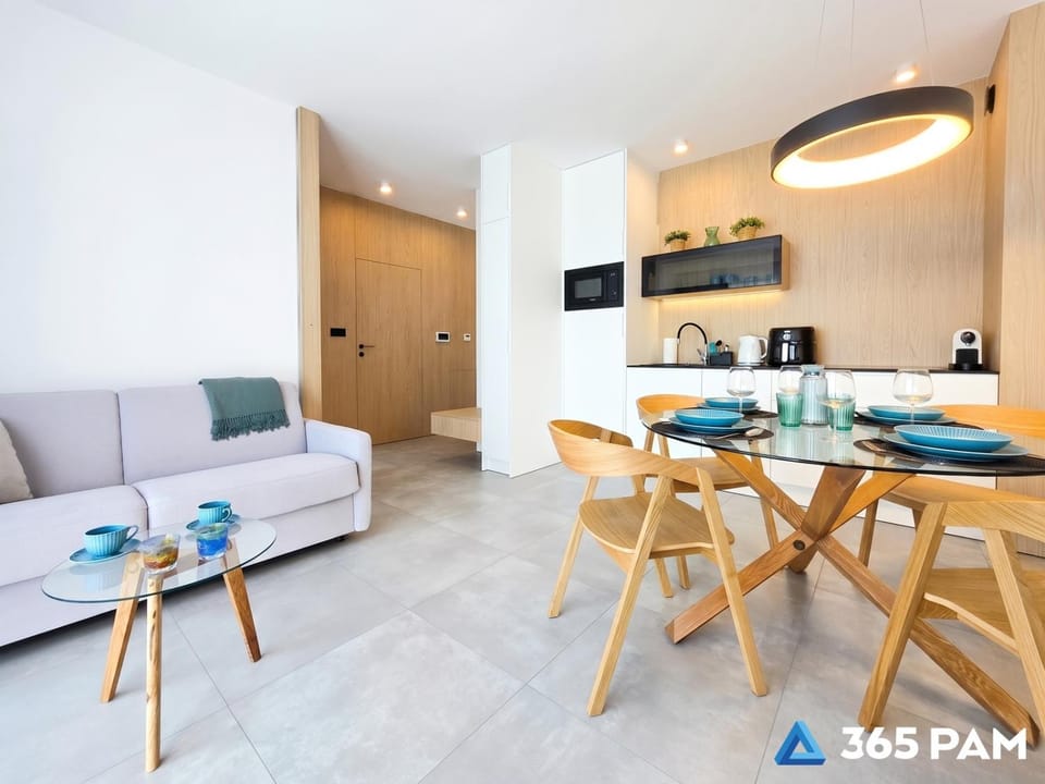 Kitchen or kitchenette, Living room, Seating area, Dining area
