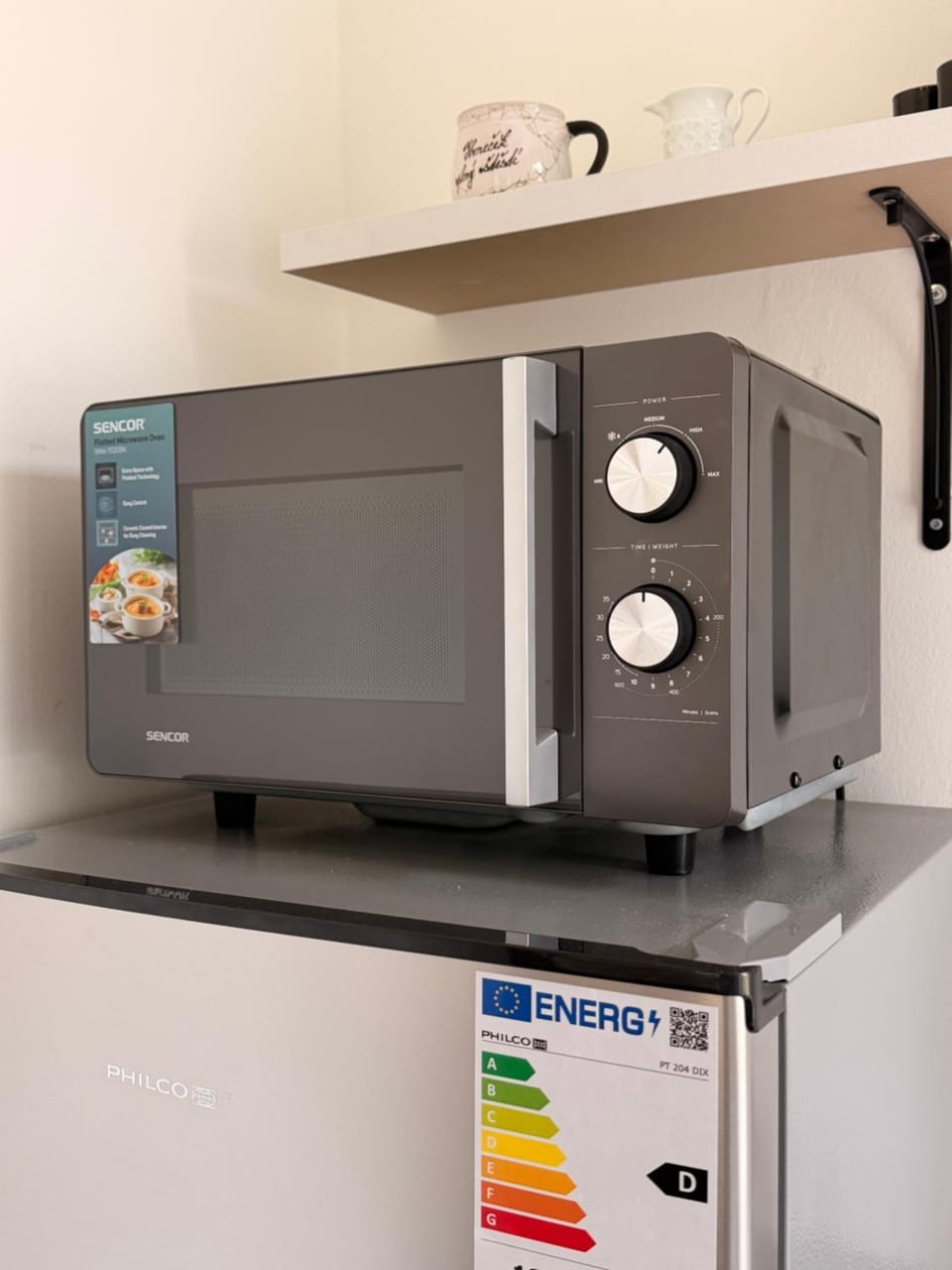 Kitchen or kitchenette, microwave
