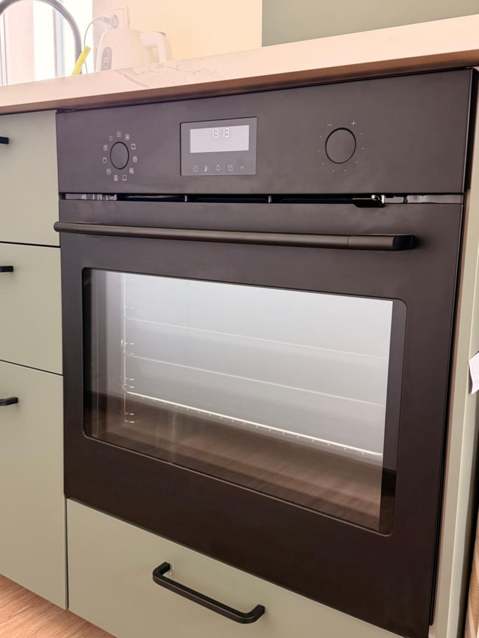 Kitchen or kitchenette, oven