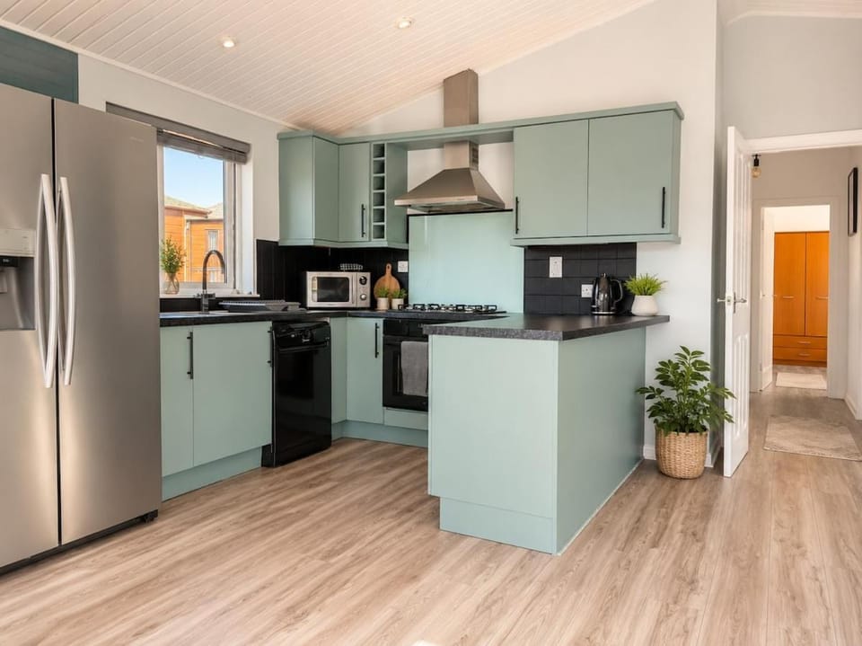 Kitchen or kitchenette, dishwasher, pet friendly, stove, toaster, washing machine