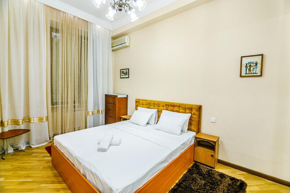 Bed, Bedroom, towels, air conditioner