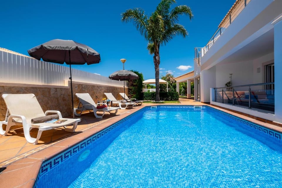 Property building, Living room, Swimming pool