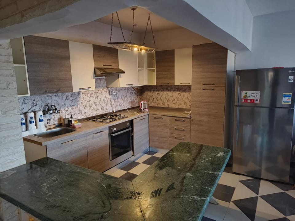 Kitchen or kitchenette, oven, stove