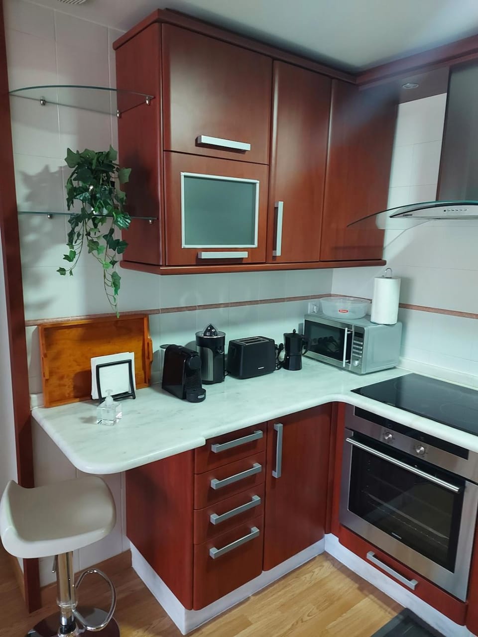 Kitchen or kitchenette, dishwasher, oven, stove, toaster