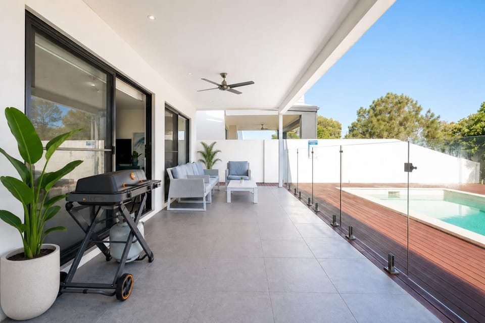 Patio, BBQ facilities, Seating area, Swimming pool