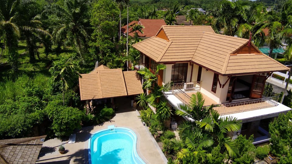 Property building, Patio, Day, Garden, Pool view, Swimming pool