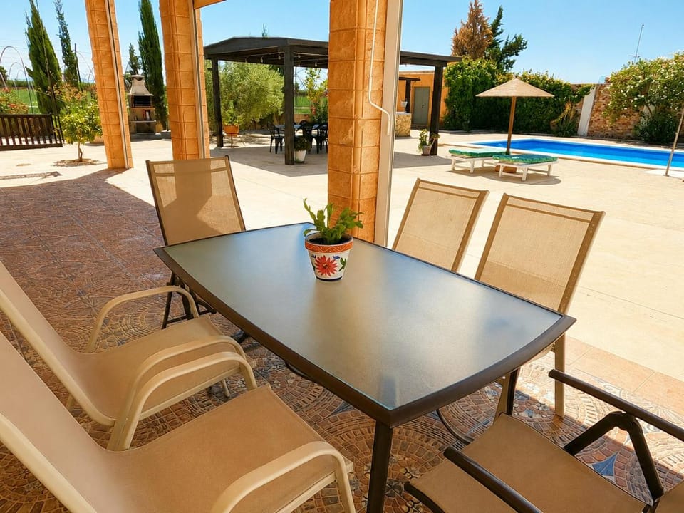 Patio, Dining area, Pool view
