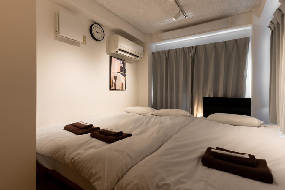 Bed, Photo of the whole room, Bedroom, towels, air conditioner