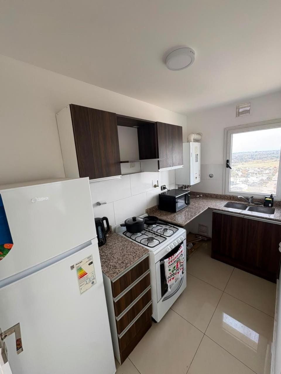 Kitchen or kitchenette, oven, stove