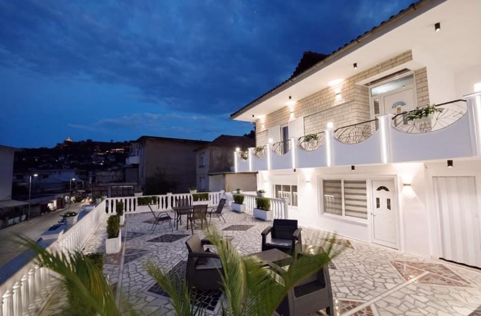 Property building, Patio, Night, Balcony/Terrace, Seating area