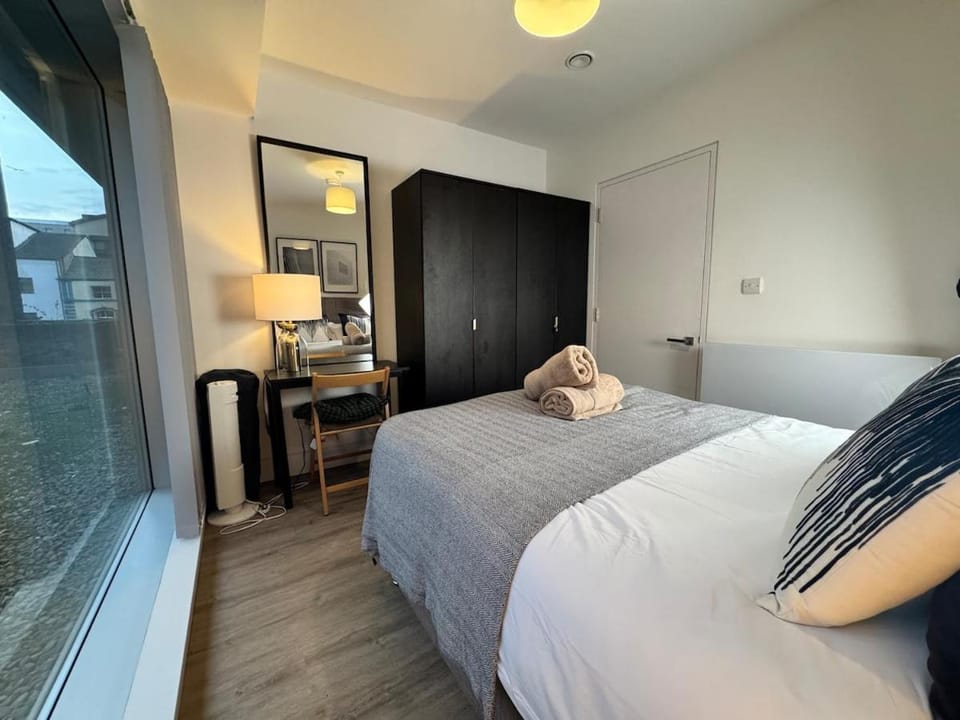 Floor-to-Ceiling Windows with Kitchen Island Apartment in Liverpool