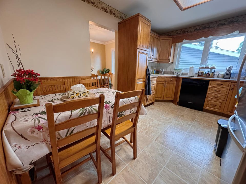 Kitchen or kitchenette, dishwasher, oven, stove