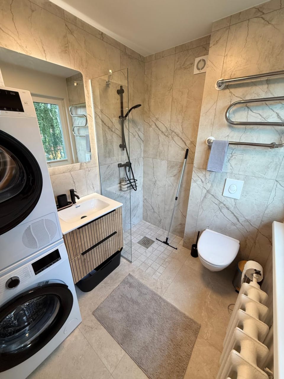 Shower, Toilet, Bathroom, towels, washing machine, dryer