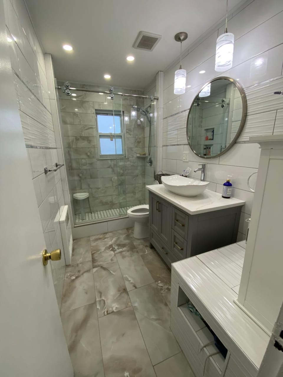 Shower, Toilet, Bathroom, hair dryier, towels
