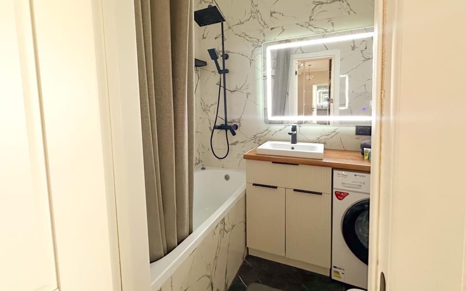 Уютная дизайнерская 1-комнатная квартира в Астане Apartment in Kazakhstan