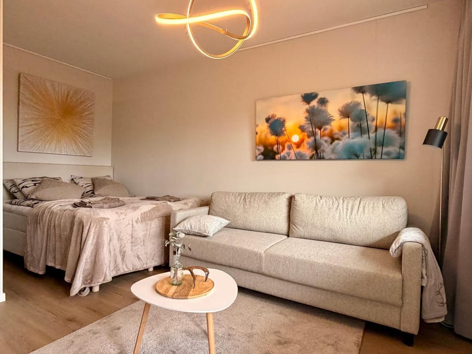 Bed, Living room, Seating area, Bedroom