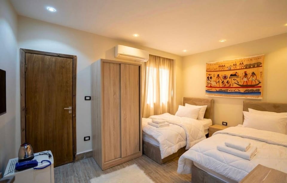 Bed, Photo of the whole room, Bedroom, towels, wardrobe