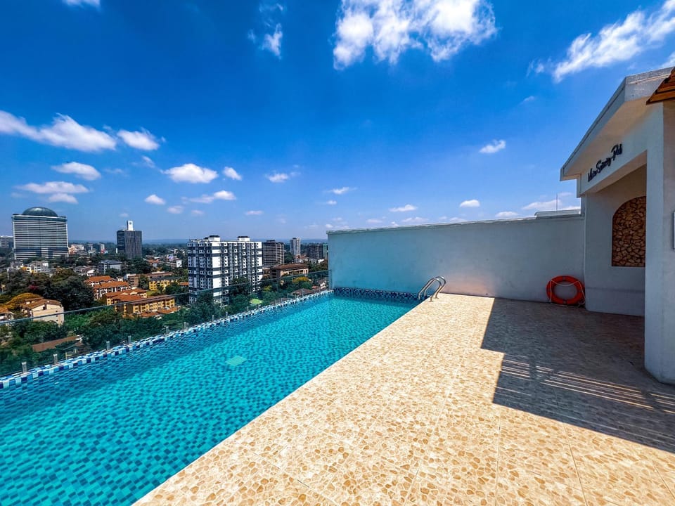 Property building, Day, View (from property/room), Balcony/Terrace, City view, Pool view, Swimming pool, sunbed