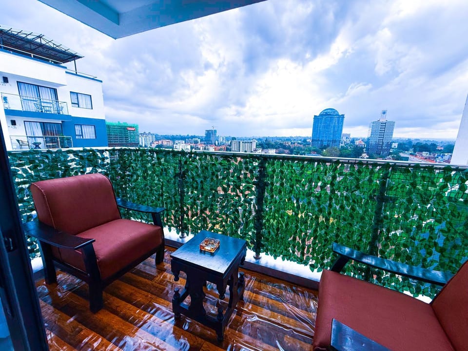 Property building, Patio, Day, View (from property/room), Balcony/Terrace, Living room, Seating area, City view