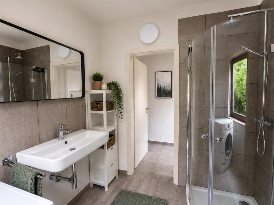 Shower, Toilet, Bathroom, hair dryier, towels, dryer