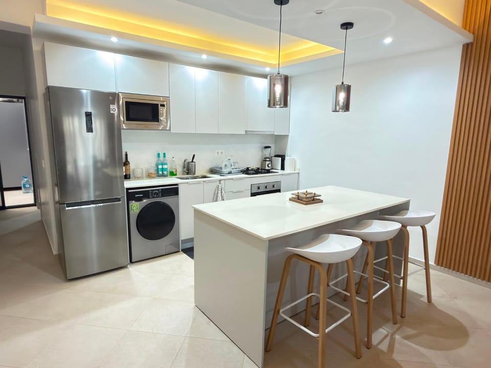 Kitchen or kitchenette, Dining area, oven, stove, washing machine