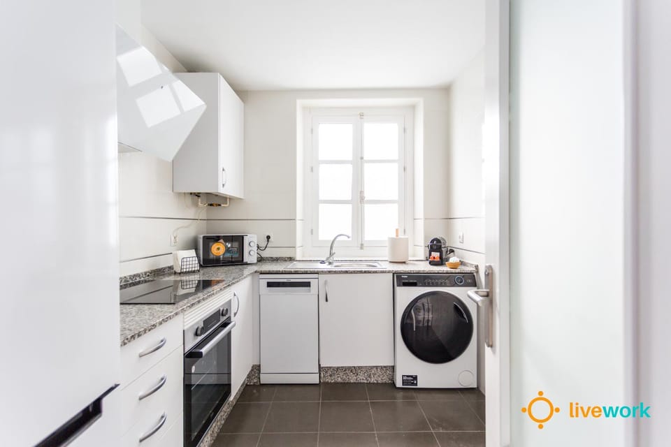 Kitchen or kitchenette, dishwasher, oven, toaster, washing machine