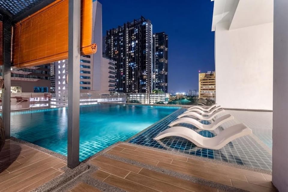 Night, View (from property/room), City view, Pool view, Swimming pool