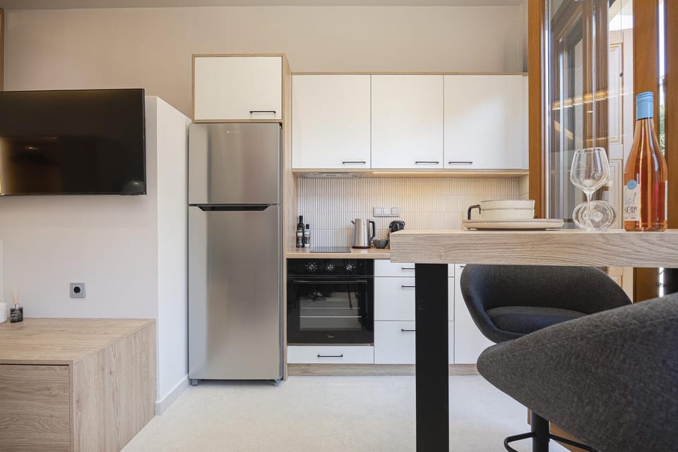 Kitchen or kitchenette, oven, stove, toaster