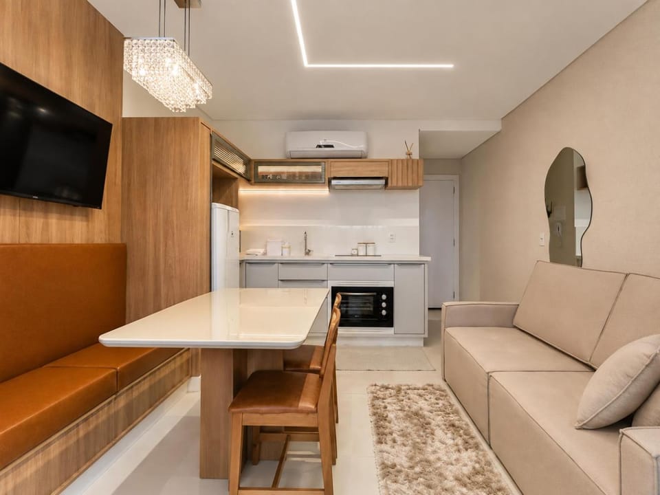 TV and multimedia, Kitchen or kitchenette, Living room, Seating area, Dining area, stove, air conditioner